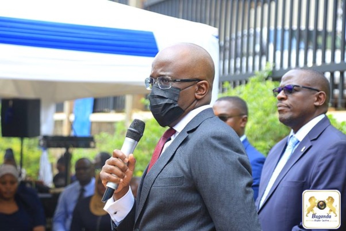 Minister Daudi Mpanga addressing the Buganda Land Board staff